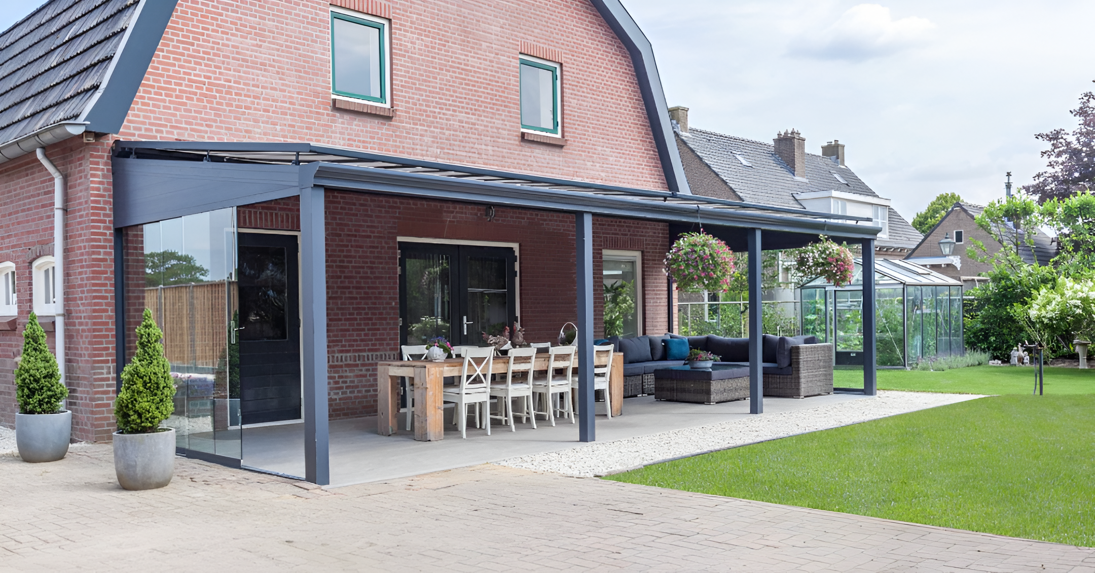 Deponti Pigato Aluminium Pergola Veranda Grey - Front Side View with Dining Table and Sofa Set