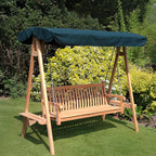 Chic Teak wooden garden swing seat with dark green canopy in a garden setting