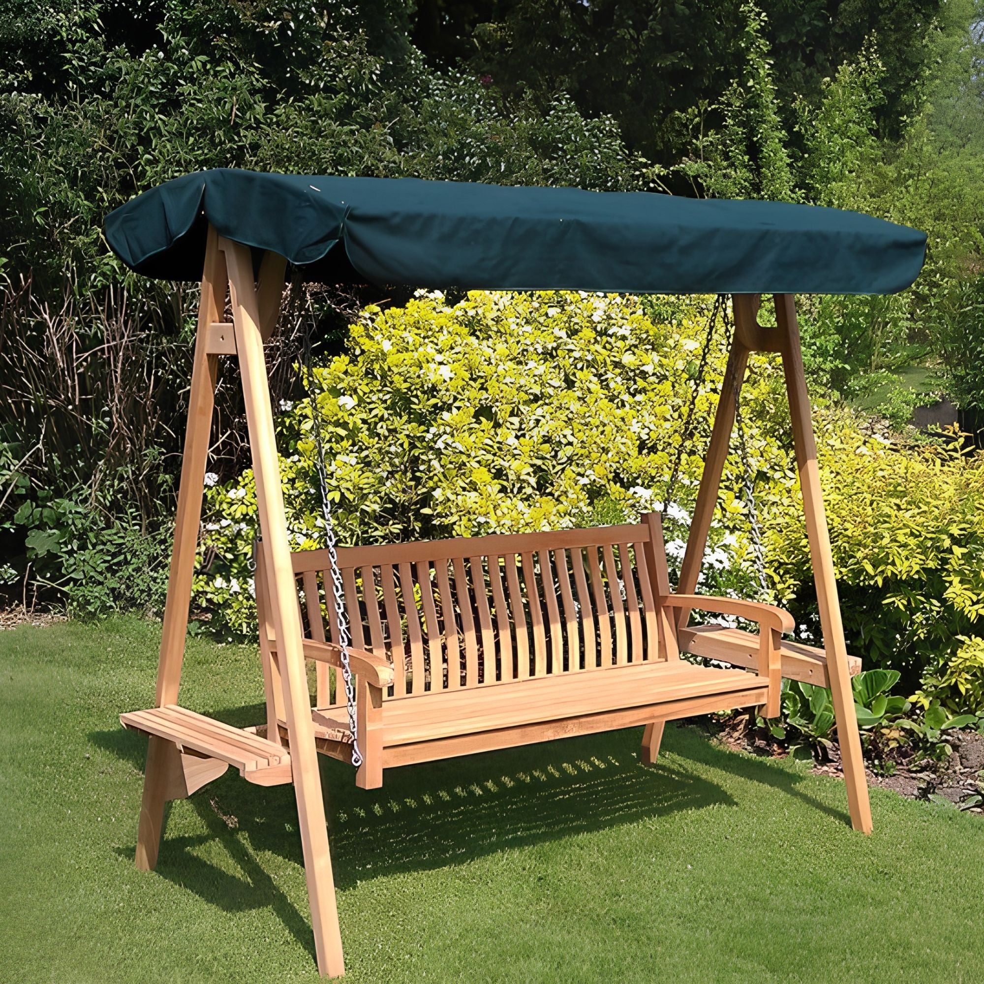 Chic Teak wooden garden swing seat with dark green canopy in a garden setting