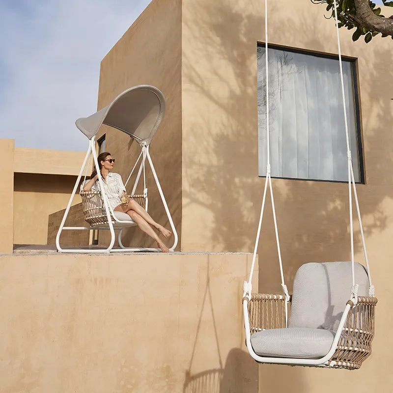 Moon Single Swing Seat White / Ivory with a woman on the swing Lifestyle Image
