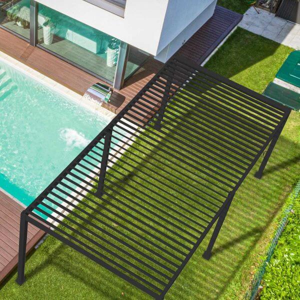 A pergola next to a pool from above
