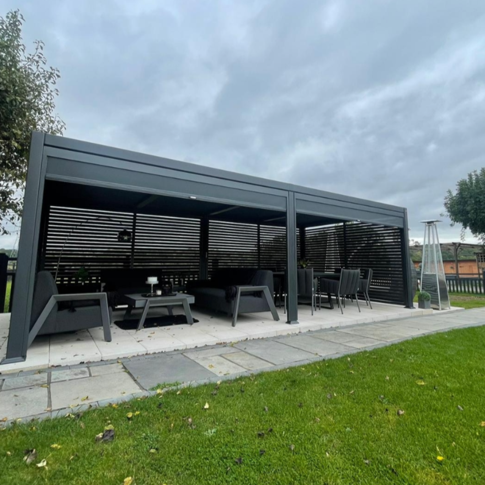 Suns Lifestyle Maranza Vented Pergola Lifestyle with Sofa and Dining Table