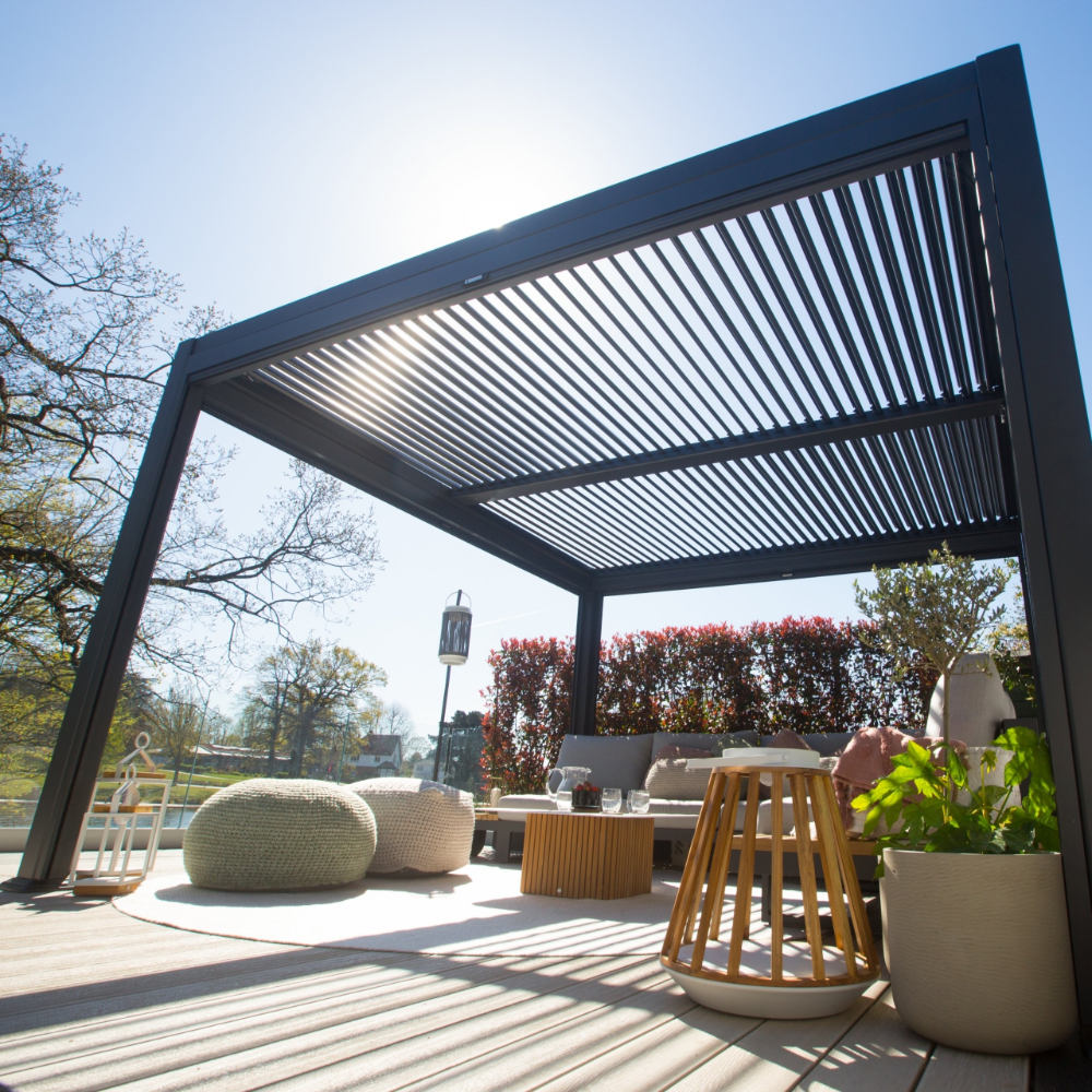 Suns Lifestyle Maranza Vented Pergola Lifestyle with Sofa and Table Open Roof