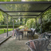 Suns Lifestyle Maranza Vented Pergola Lifestyle with Dining Table and Chairs Open Roof