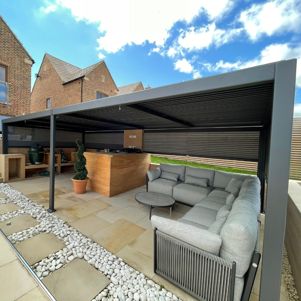 Suns Lifestyle Maranza Vented Pergola Lifestyle with Sofa and Table